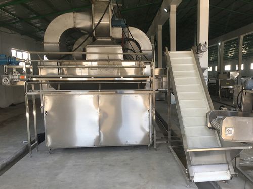 Cinta transportadora elevadora y esparcidor rotativo