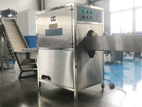 Máquina para cortar las cabezas de cebollas